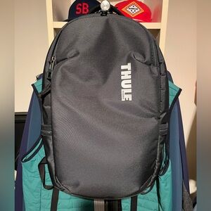 Thule Medium Size Laptop Backpack, black, nice storage, great used condition